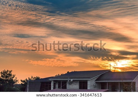 Sunset over the roofs. South of Russia