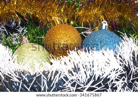 Background for New Year's and Christmas cards. Celebratory  holiday bright rainbow decorations for Christmas trees or pine
