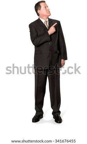 Serious Caucasian elderly man with short medium brown hair in business formal outfit pointing using finger - Isolated