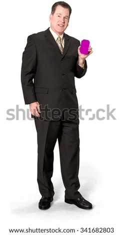 Serious Caucasian elderly man with short medium brown hair in business formal outfit holding phone placeholder - Isolated