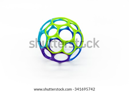 Plastic sphere toy with different size holes