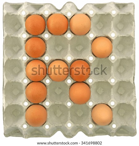 A letter R from the eggs in paper tray for food or nutrition concept