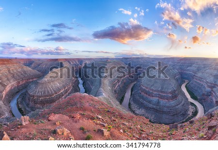 Goosenecks are a famous entrenched meanders on San Juan river. Sunset time. Goosenecks State Park, Utah - USA. Panoramic photo