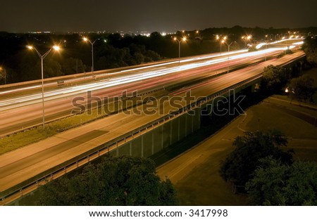 A busy six lane highway taken at night Royalty-Free Stock Photo #3417998