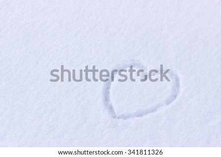 Heart picture on the snow surface