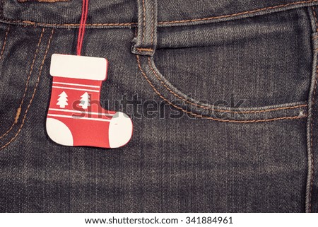 New year, Christmas background. Jeans texture with a pocket.