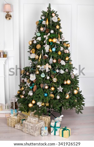 Christmas gifts under the Christmas tree Royalty-Free Stock Photo #341926529