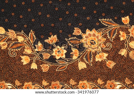 The beautiful of art Malaysian and Indonesian Batik Pattern Royalty-Free Stock Photo #341976077