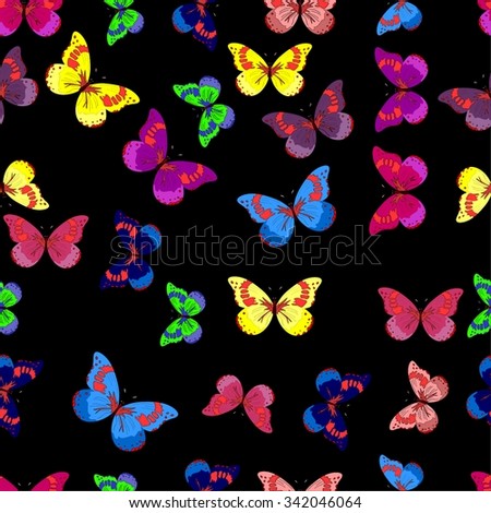 flying multicolored butterflies on a black background