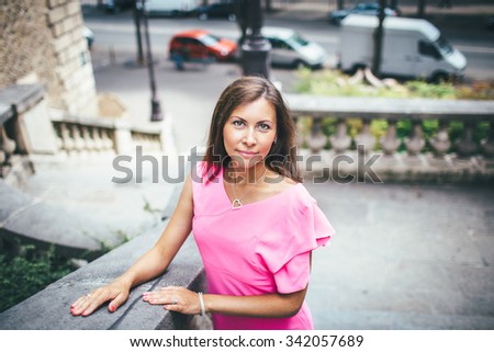 woman of tourists taking photo with Eiffel Tower in Paris, tourism in Europe, France