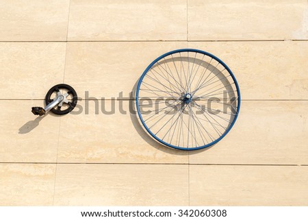 Wheel rim parts of bicycle on the wall