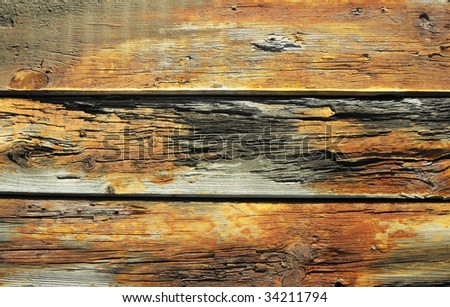 Wooden fence with fire traces