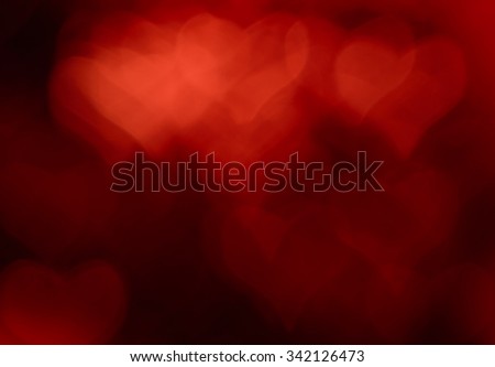 Many red hearts bokeh, blurred background