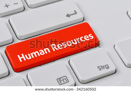 A keyboard with a red button - Human Resources