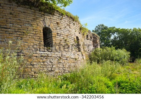 Ivangorod Fortress Ruins. The round corner tower with loopholes.