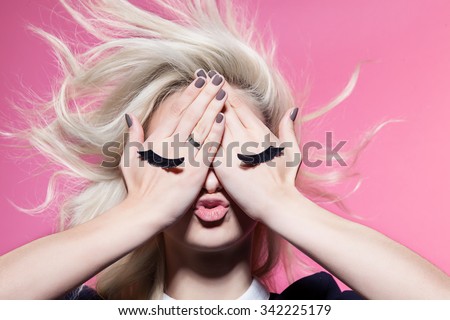 Girl with closed eyes painted on hands