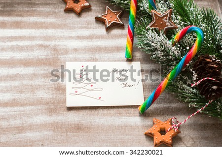 Christmas time interior decorations on the rustic background with gingerbread and christmas candy