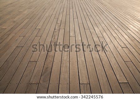 Wooden deck background lumber pattern Royalty-Free Stock Photo #342245576