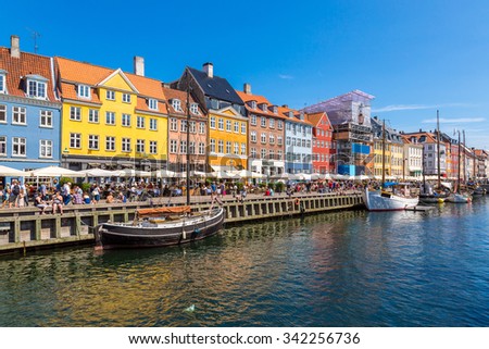 Nyhavn district is one of the most famous landmark in Copenhagen in a summer day Royalty-Free Stock Photo #342256736