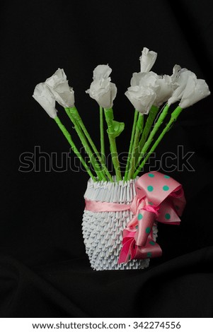 paper flowers made by child in white vase 