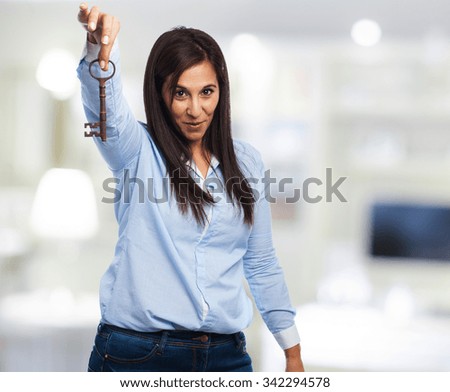 happy young-woman with keys