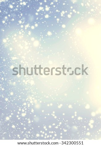 Beautiful abstract photo of light burst and glitter bokeh lights, image is blurred and filtered. Golden Lights on blue background.