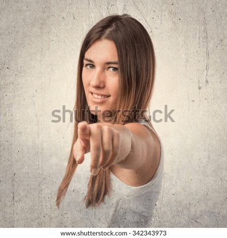 Girl pointing to the front