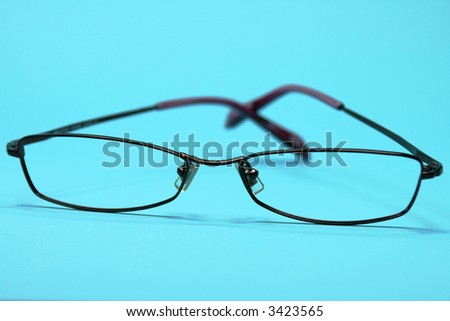 Eyeglasses on a blue background
