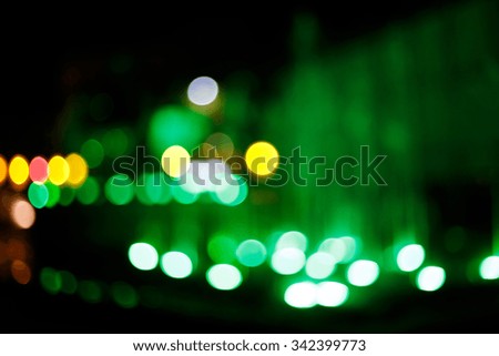 Blurred city and water fountains light for background