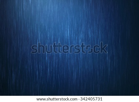 the rain water drop falling in rainy season with dark blue color as abstract  background
