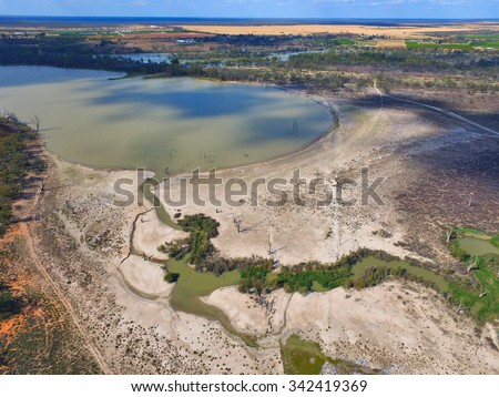 helicopter aerial view murray river wetlands lagoons & back water river murray darling basin. Drought stricken irrigation area & mallee areas in outback australia, creek inlet and salt pan. Elrimal
 Royalty-Free Stock Photo #342419369