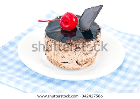 Cake with Cherries and Chocolate, Cupcake on Wood Background. Studio Photo.