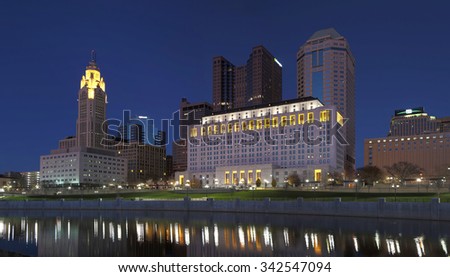 Scioto River and downtown Columbus Ohio skyline at John W. Galbreath Bicentennial Park at dusk