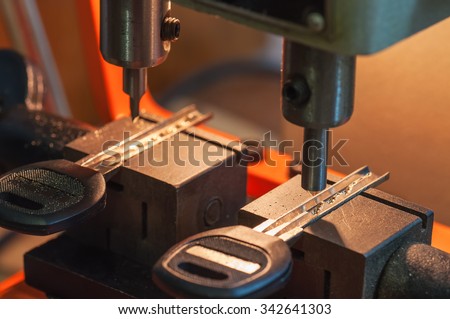 professional machine makes a new keys Royalty-Free Stock Photo #342641303