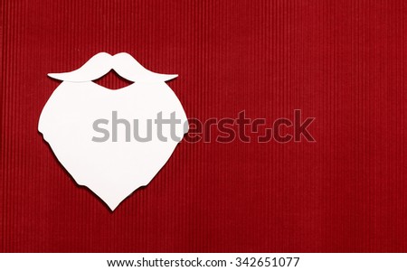paper Santa Claus isolated over red background