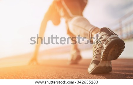 Athlete runner feet running on treadmill closeup on shoe Royalty-Free Stock Photo #342655283