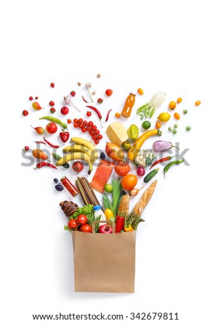 Healthy food in package / studio photography of different fruits and vegetables isolated on white backdrop, top view. High resolution product.
