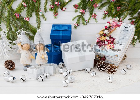 Christmas composition with gift boxes and angels