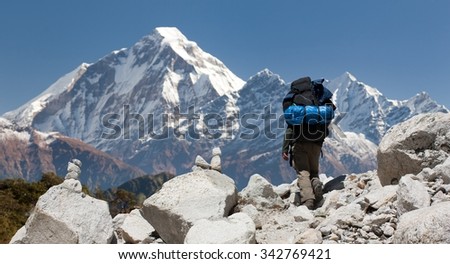 View of mount Dhaulagiri with tourist, great himalayan trail, Nepal Royalty-Free Stock Photo #342769421