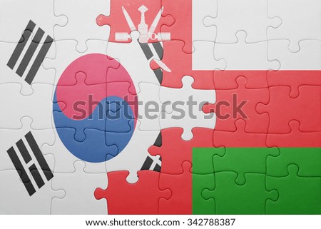 puzzle with the national flag of oman and south korea . concept