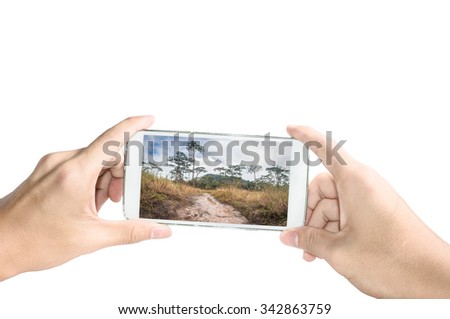 Holding smart phone take a photo of Phu Soi Dao National Park on white background