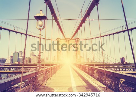 Vintage stylized picture of the Brooklyn Bridge in New York City, USA.