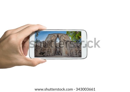 Holding smart phone for capture, Take a photo of Sukhothai Historical Park
, Thailand.