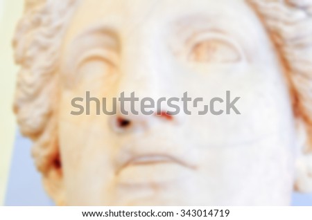 Defocused background of classical sculpture. Intentionally blurred post production for bokeh effect