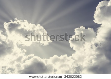 Sunshine on clear blue sky and white cloud with copy space. Natural concept to present good weather and happiness in summer or winter season. 