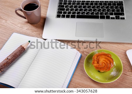 View of comfortable working place on wooden background