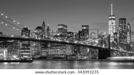 Black and white Manhattan waterfront at night, New York City, USA.