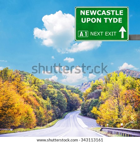 NEWCASTLE UPON TYDE road sign against clear blue sky