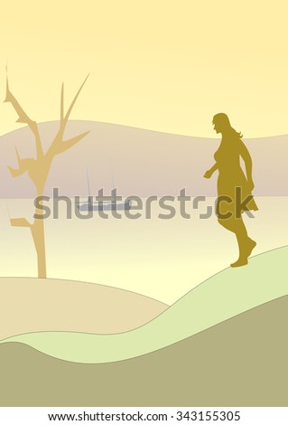 A woman walking by the sea and a bare tree and a sailboat far away.
