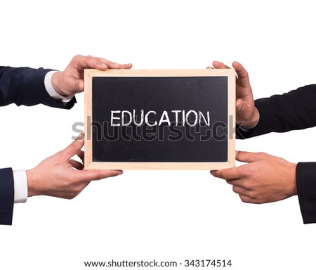 Two man holding mini blackboard with EDUCATION message